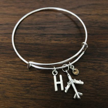 Airplane bracelet with charms