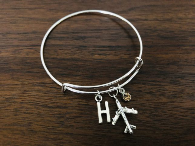 Airplane bracelet with charms